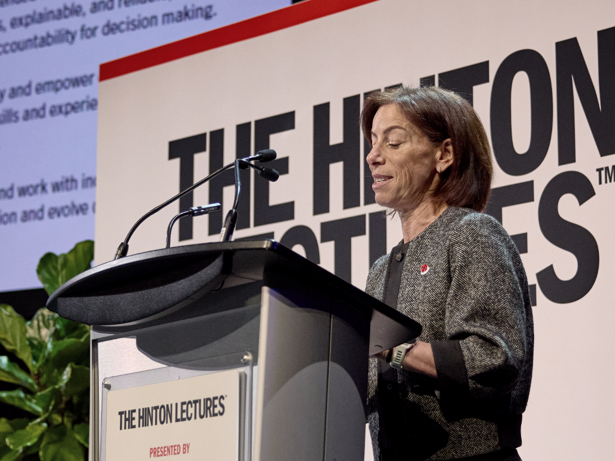 Speaker at the podium during a past Hinton Lectures evening